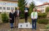 Biegacze stoją na podium